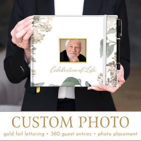 GetProducts elegant white funeral guest book sized around 10 by 8 inches.