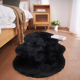 Ghouse soft faux-sheepskin rug 2x4 black adds cozy warmth to living spaces