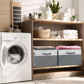 GhvyenntteS bin in laundry room for towels and supplies.