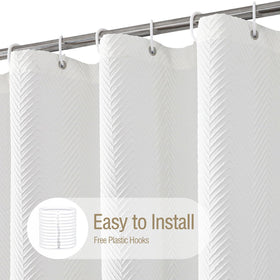 Gibelle shower curtain features rustproof grommets for easy hanging