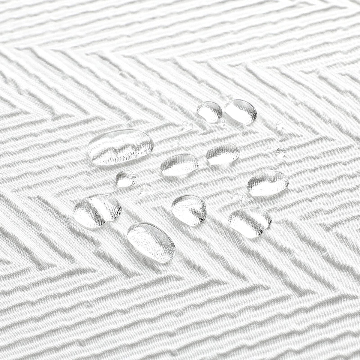 Gibelle shower curtain offers partial water repellency; pair with liner for protection