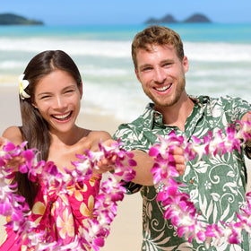 Giegxin beach wedding with glowing leis as decor