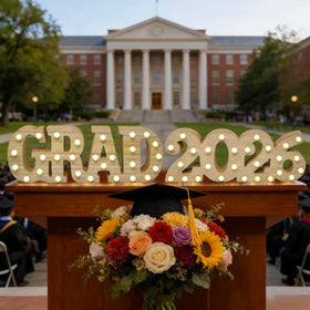 Gift Boutique marquee letters add rustic-modern charm to graduation décor