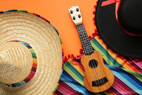 GiftExpress adjustable chin strap keeps sombrero secure during celebrations.