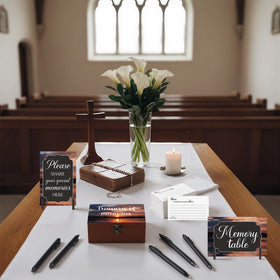 Gilprop memorial writing pens invite guests to share memories.