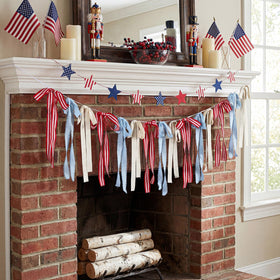 Indoor setup of Gilprop patriotic bow banner over a doorway