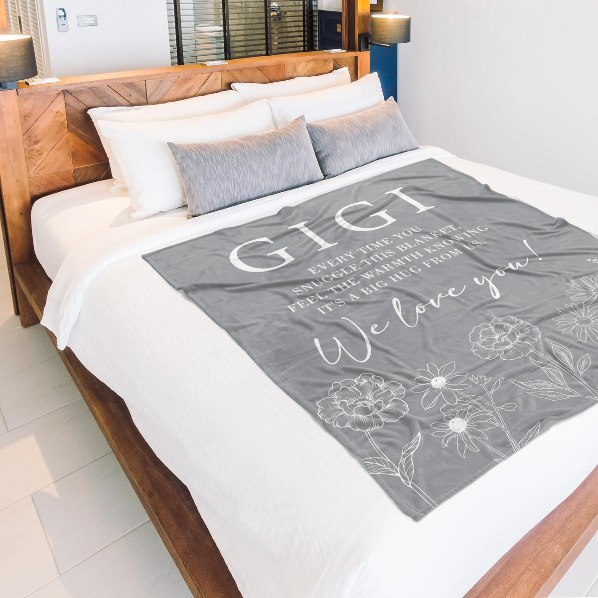 Grandkids present Gigi blanket, a heartfelt gift moment.