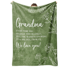 GiltGlimmer grandma blanket 50x60 in grass green, a cozy warmth for relaxing evenings.