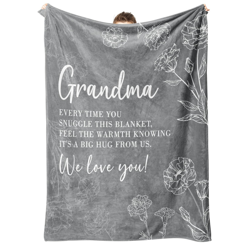 GiltGlimmer grandma blanket folded in gray, a cozy gift idea.