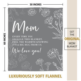 GiltGlimmer mom blanket travel use suggested by lifestyle setting.
