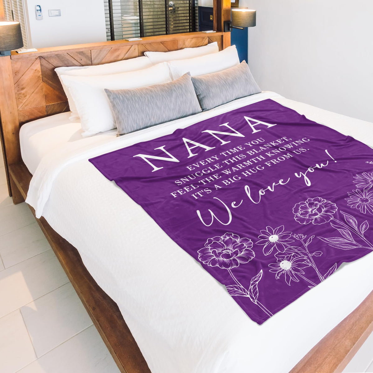GiltGlimmer Nana blanket draped on bed as decorative cozy touch