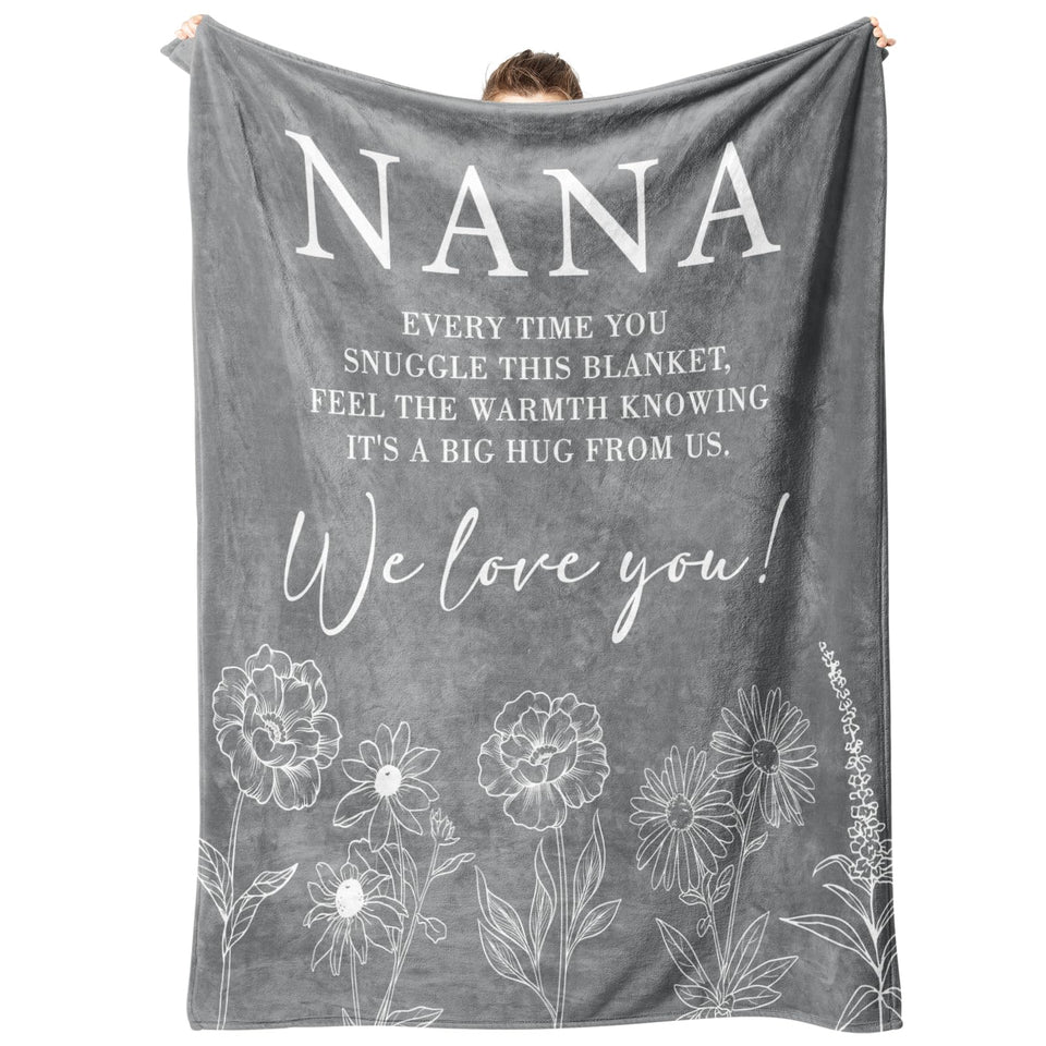 GiltGlimmer Nana gifts soft throw blanket on a cozy couch