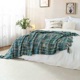 GINAMUSE 50x60 throw draped over bed and couch for layering