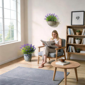 Gipsot front porch display adds color without daily upkeep.