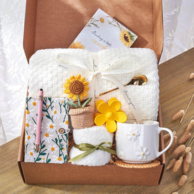 GivLovely Thinking of You box unboxing with sunflower packaging—brightens her day.