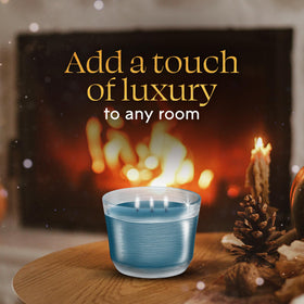 Phthalates- and parabens-free Glade Embers & Sandalwood candle.