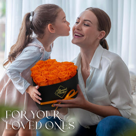 GLAMOUR BOUTIQUE box open reveal of orange roses.