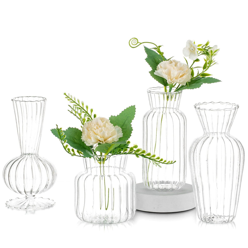 Glasseam four-piece clear bud vase set for elegant centerpieces and versatile home décor.