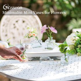 Glasseam rose-tulip-eucalyptus vase highlights blooms with elegant simplicity