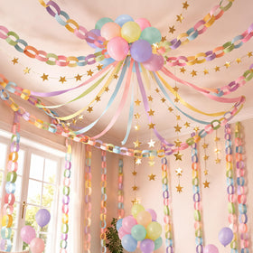 Gleebixi pastel streamers forming layered party decor for a photo backdrop