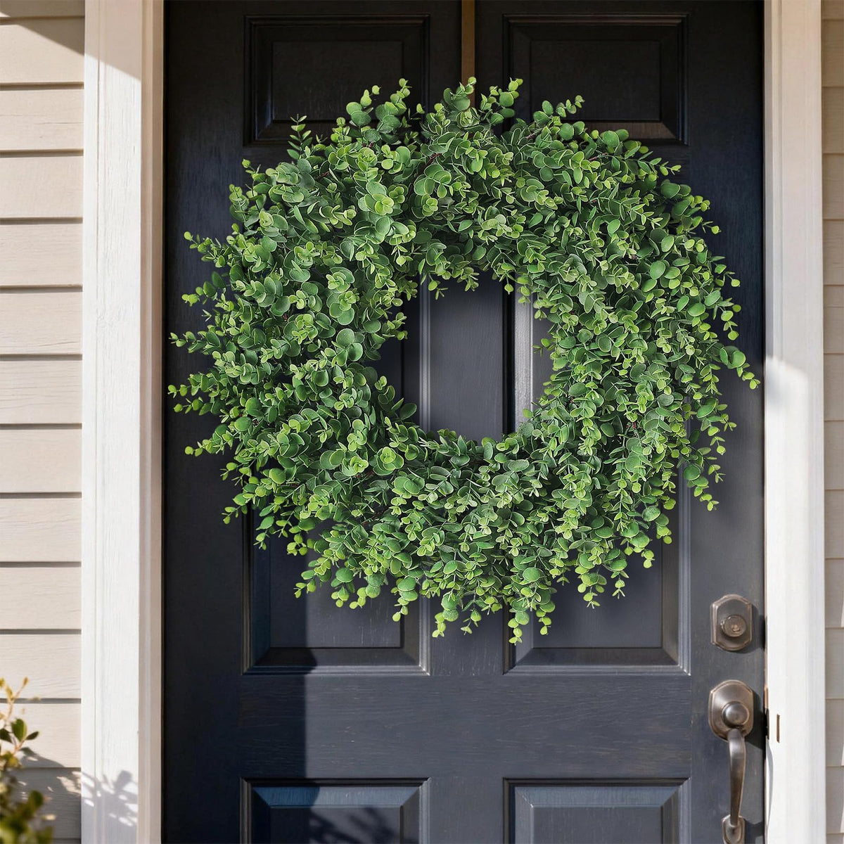 Wreath spans 22-24 inches, ideal for standard doors