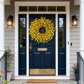 GLIDLION 24-inch forsythia wreath on living room wall adds seasonal color.