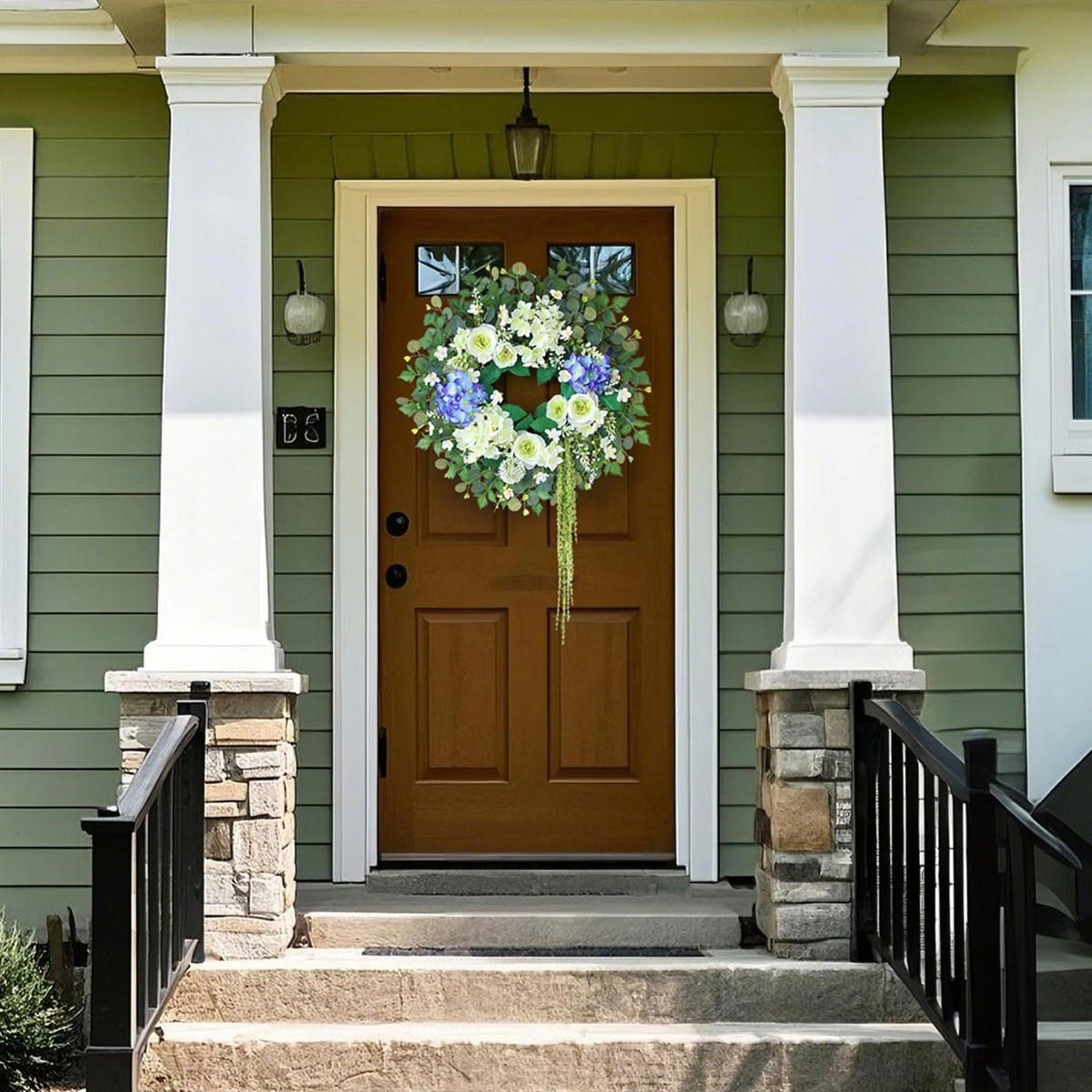GLIDLION wreath hanging on porch outdoors withstands wind and weather for year-round charm.