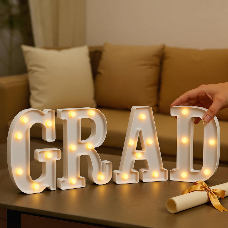 Glimmrly Grad Letters light up, ideal as a table centerpiece and photo backdrop.