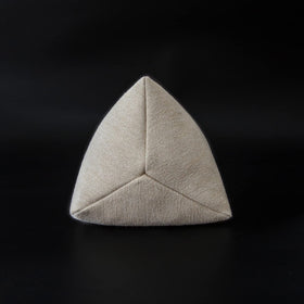 Close-up of buckwheat hulls detail inside the pillow for firm support.