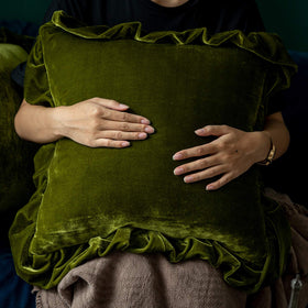 Glory Season velvet pillow cover in olive green, closeup of pleated edge detail.