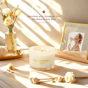 Close-up of Glowence vanilla candle showing three wicks and smooth soy wax surface.
