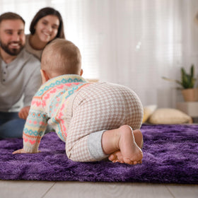 Goideal rug with non-slip backing stays in place on smooth floors.
