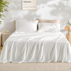 GOKOTTA king-size bamboo rayon sheets close-up shows silky-soft, cooling texture for hot sleepers.