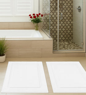 GOLD TEXTILES quick-drying bath mats for busy homes and hotels.