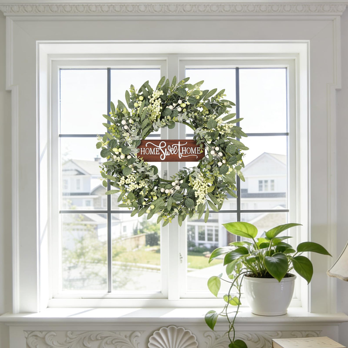 GOLUTYOK farmhouse-style greenery wreath complements doors and walls.