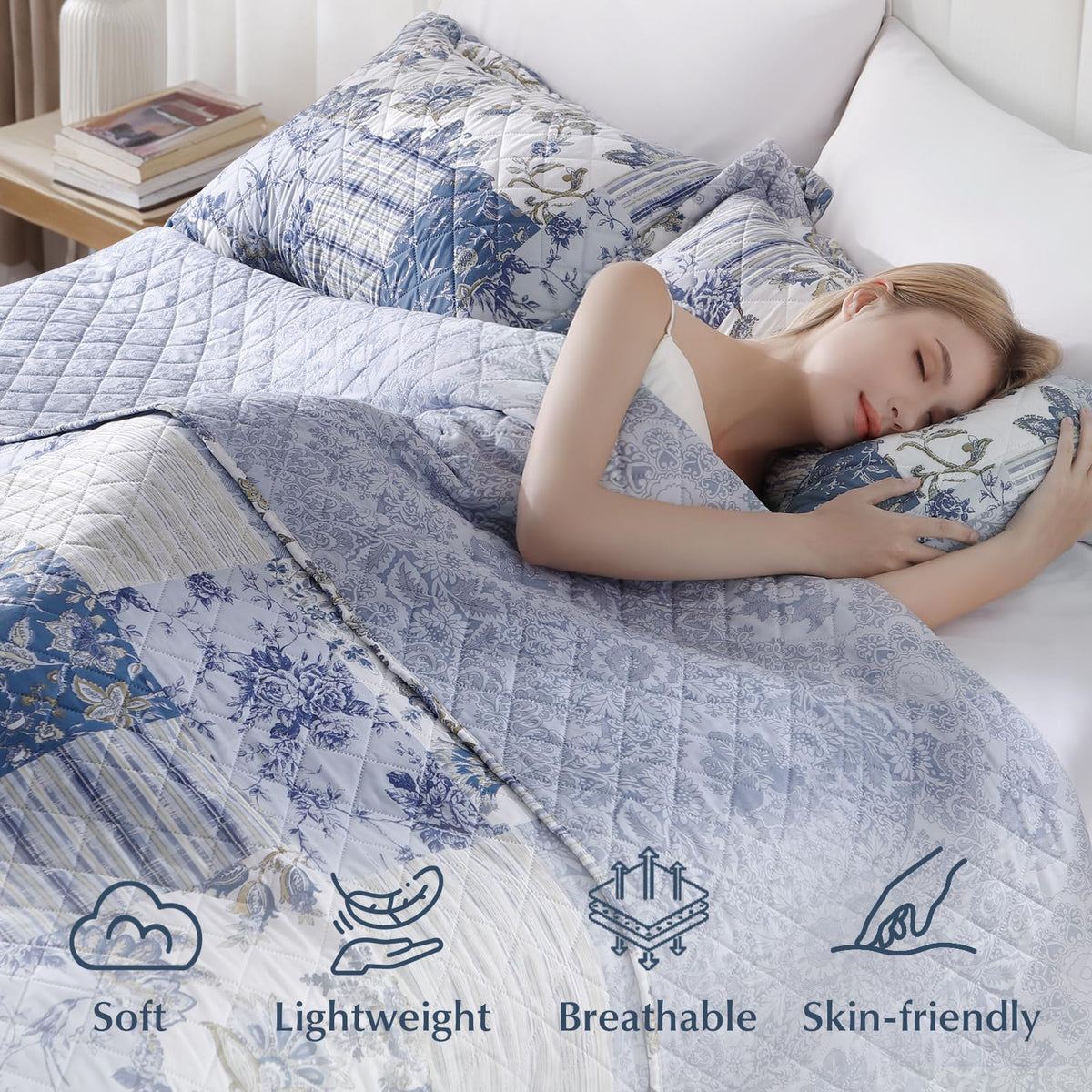 GOONE XL King Quilt Set reverses from blue floral to boho blue floral for versatile styling.