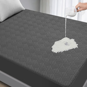 GOPOONY waterproof mattress protector on queen bed top view showing spill protection