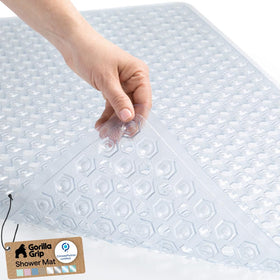 GORILLA GRIP bath mat with suction cups securing tub floor for stable footing