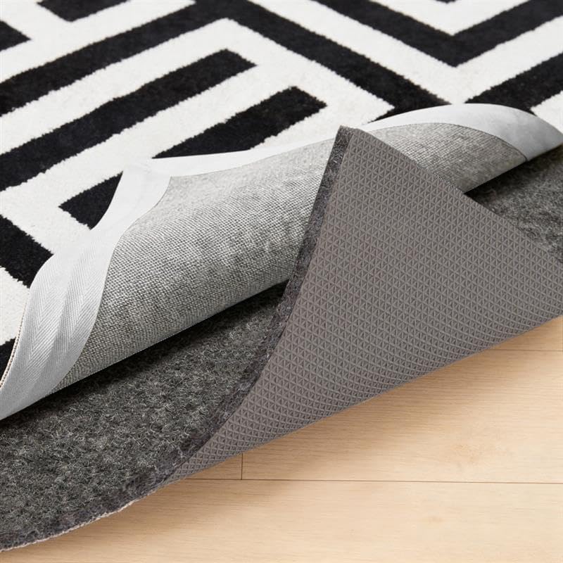 GORILLA GRIP rug pad with felt and rubber for stable rug placement.