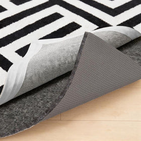 GORILLA GRIP rug pad with felt and rubber backing secures rugs on hard floors