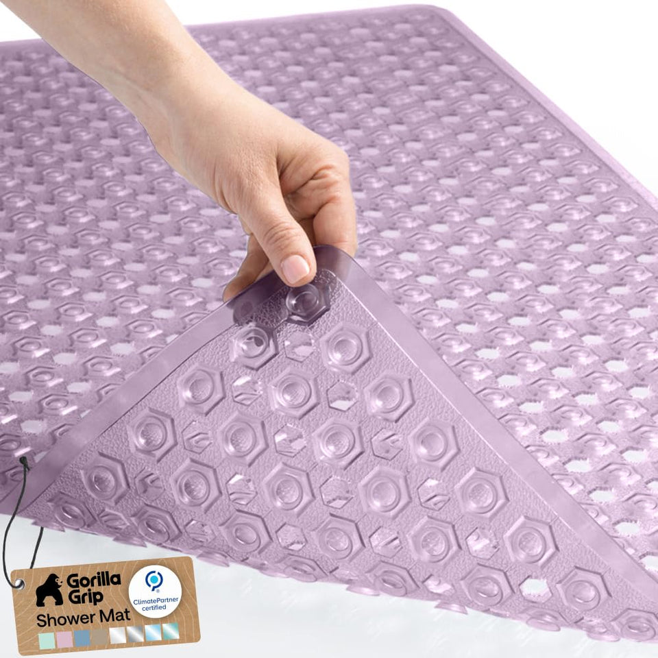 GORILLA GRIP patented bath tub mat with powerful suction cups for secure placement.