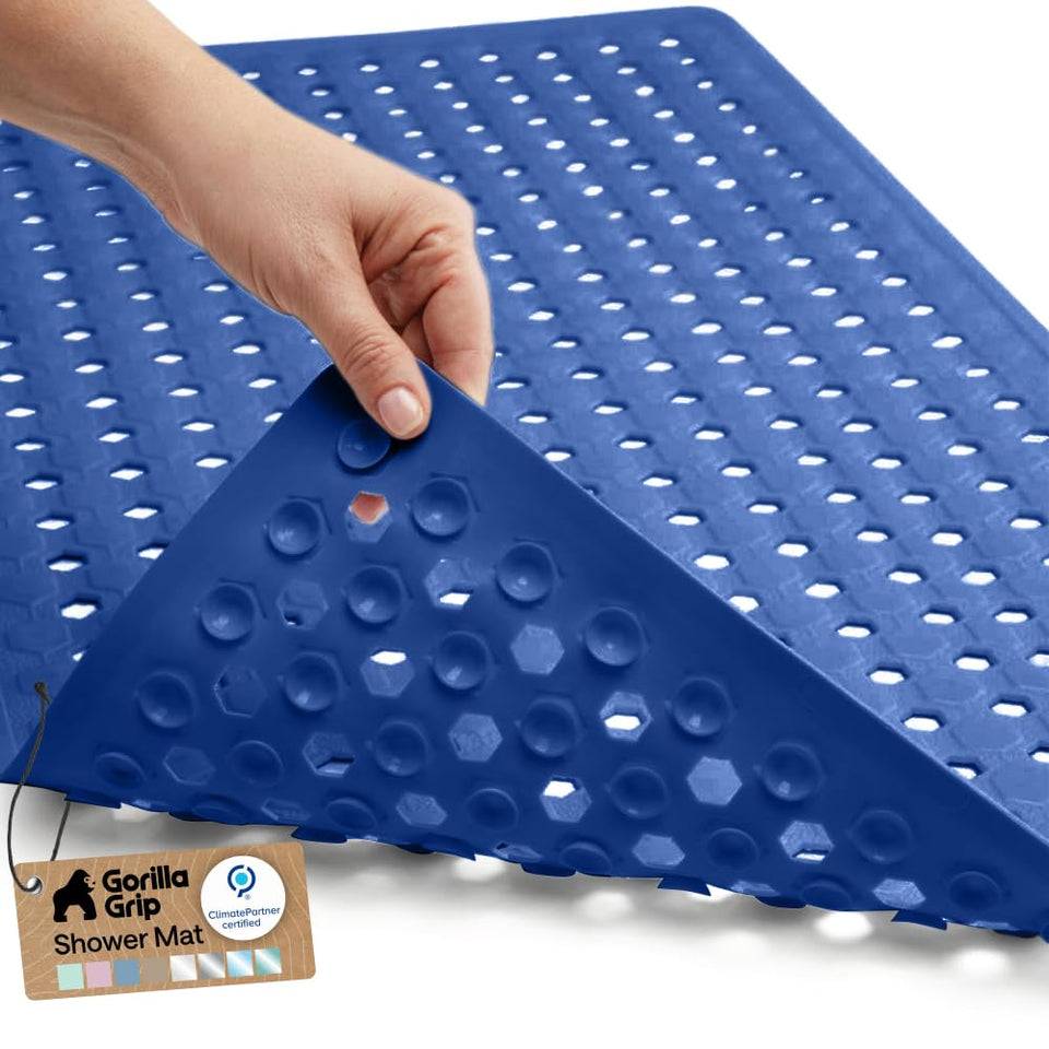 GORILLA GRIP bath mat with suction cups secures tub floors for safer entry and exit