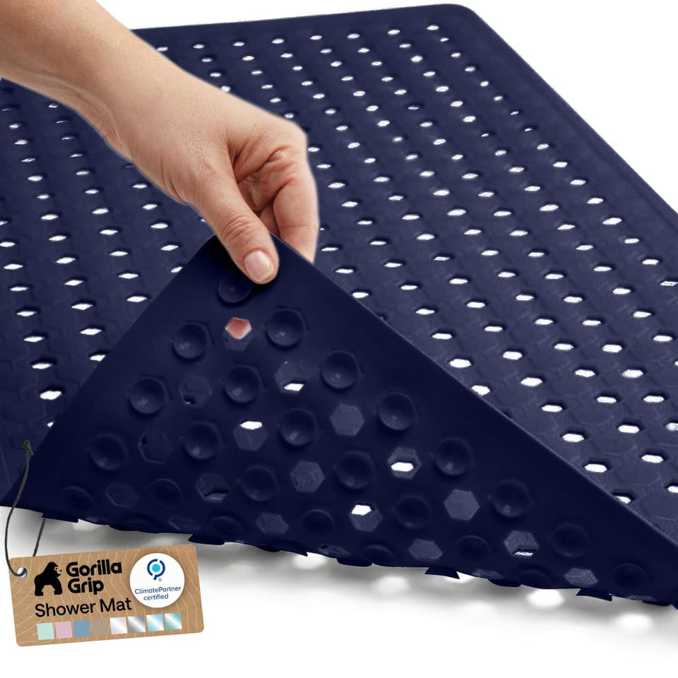 GORILLA GRIP patent tub mat with powerful suction keeps it secure.