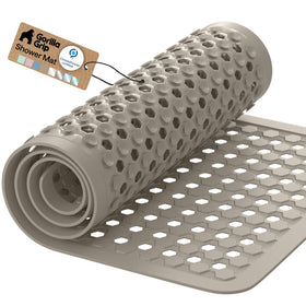 GORILLA GRIP patented bath tub mat with secure suction for stable placement on smooth tubs.