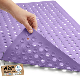 GORILLA GRIP Patented bath mat with suction cups secures tub floor.