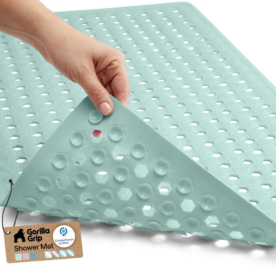 GORILLA GRIP bath mat with patented suction cups anchors to tub floor for stability