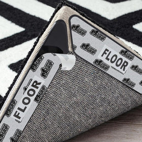 GORILLA GRIP Rug Gripper Pad under rug corners keeps floors flat and secure.