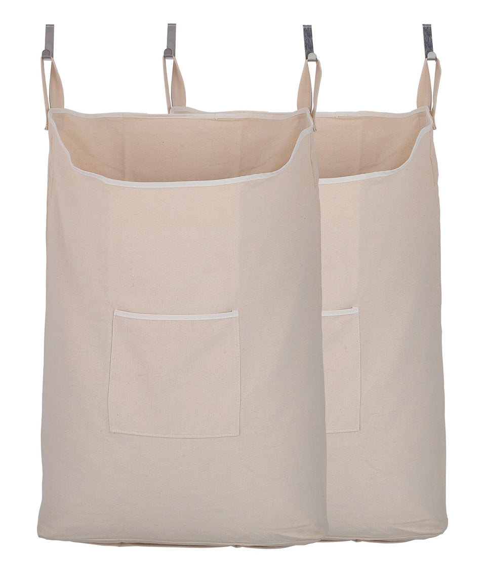 GORISEN laundry collector beige 65L hanging on a door for space-saving laundry storage.