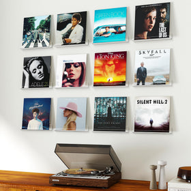 Gotega versatile shelf supports books, frames, and collectibles while remaining nearly invisible.