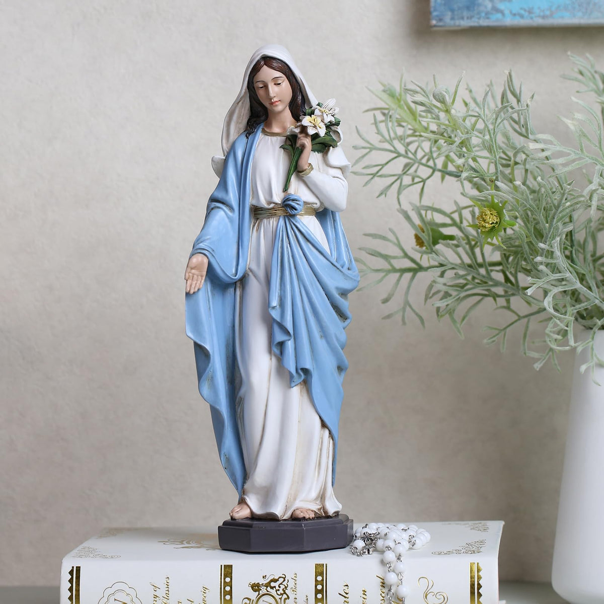 Grace4Joy Mary statue shows praying hands and lily details for calm spaces